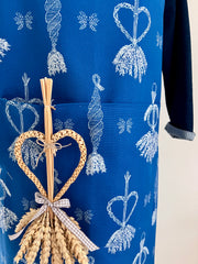 Indigo blue apron with pocket and corn dolly design in white print