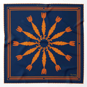 Spiral corn dolly pattern organic scarf in navy with orange and red detail print